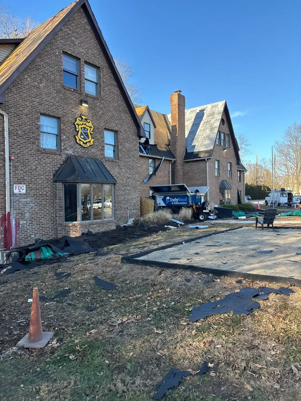 Tarping and dry-in on a Dyer commercial roof